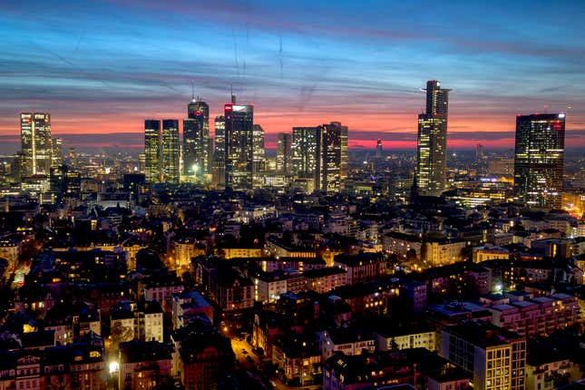 The buildings of the banking district are pictured before sunrise in Frankfurt, Germany, Tuesday, Jan. 30, 2024. (AP Photo/Michael Probst)