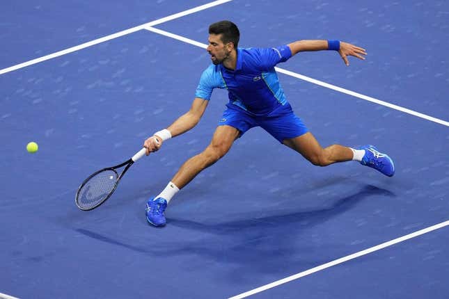 Sep 10, 2023; Flushing, NY, USA; Novak Djokovic of Serbia reaches for a forehand against Daniil Medvedev (not pictured) in the men&#39;s singles final in the men&#39;s singles final on day fourteen of the 2023 U.S. Open tennis tournament at USTA Billie Jean King National Tennis Center.