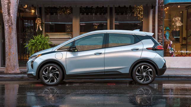 A photo of a pale blue Chevrolet Bolt EV. 