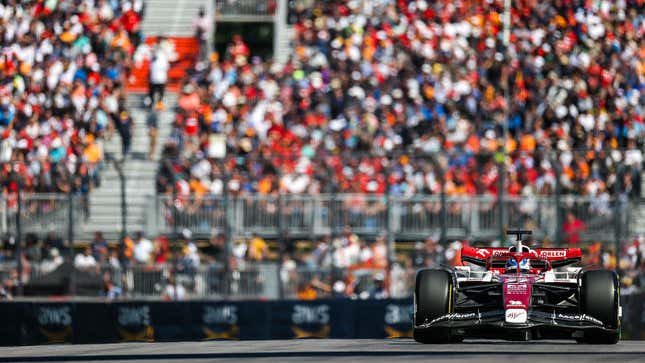 A photo of an Alfa Romeo F1 car racing in Canada. 