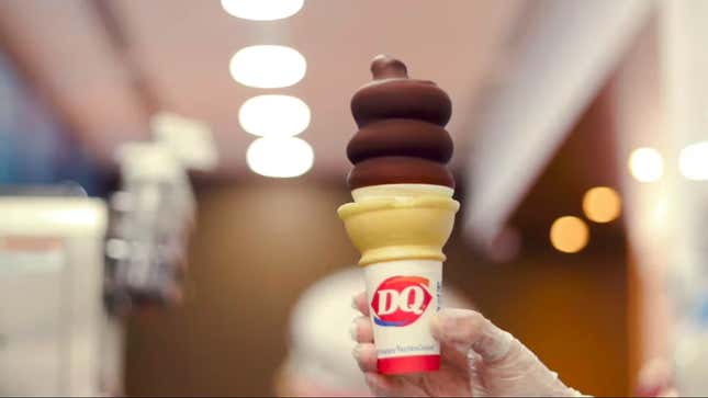 hand holding dairy queen cone