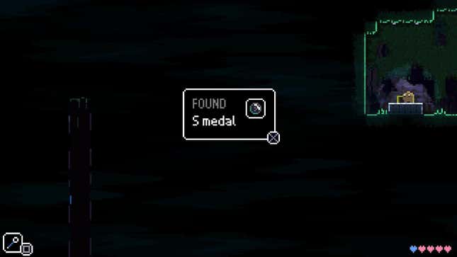 A screenshot from Animal Well displays the words "FOUND S medal" in the center of the screen.
