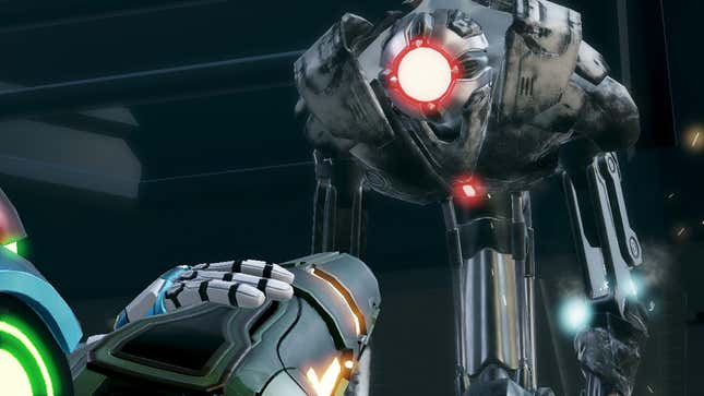 A damaged E.M.M.I., with Samus' blaster arm pointed at it in the foreground.