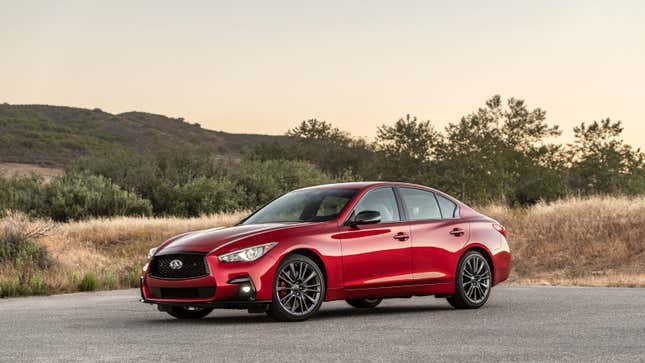 A photo of a red Infiniti Q50 sedan. 