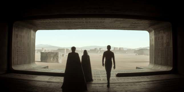 Three people walking into Arrakis