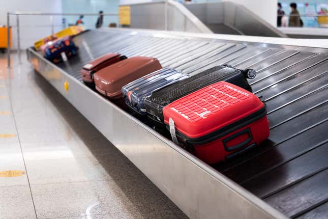 Suitcases on belt