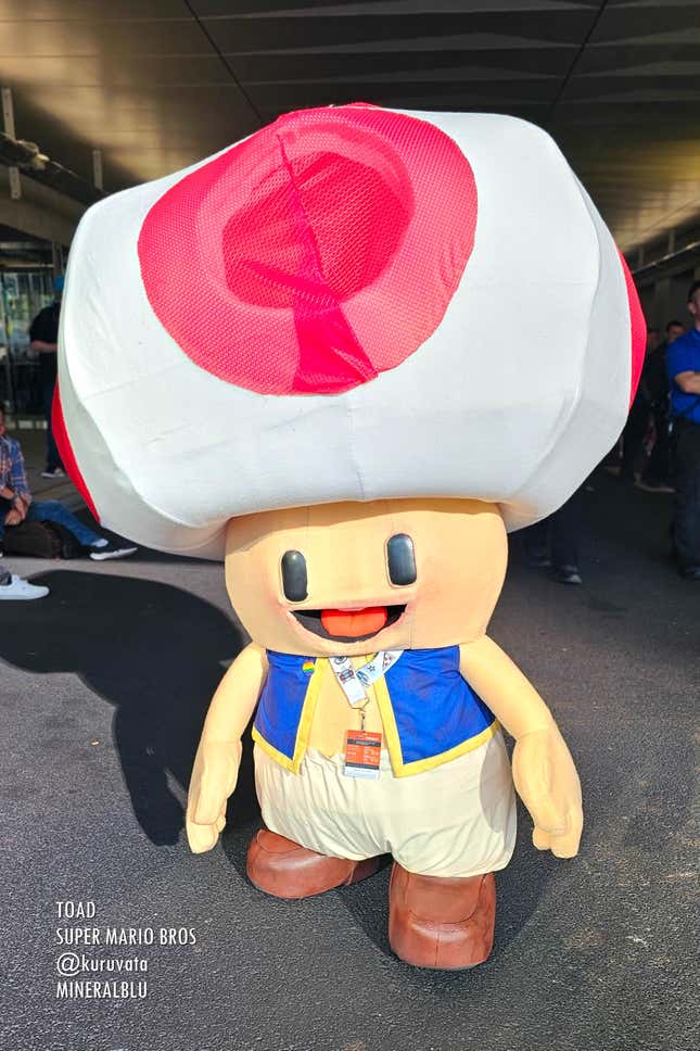 A person wears a Toad costume at NYCC.