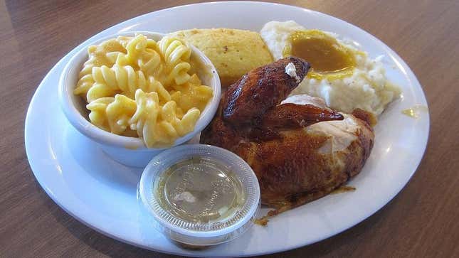 Boston Market rotisserie chicken with Mac and Cheese, Mashed Potatoes, cornbread, and Rosemary Lemon sauce