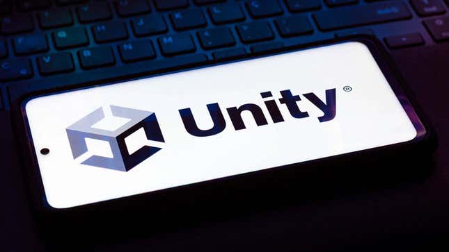 Le logo Unity est superposé sur ce qui semble être un clavier en arrière-plan.