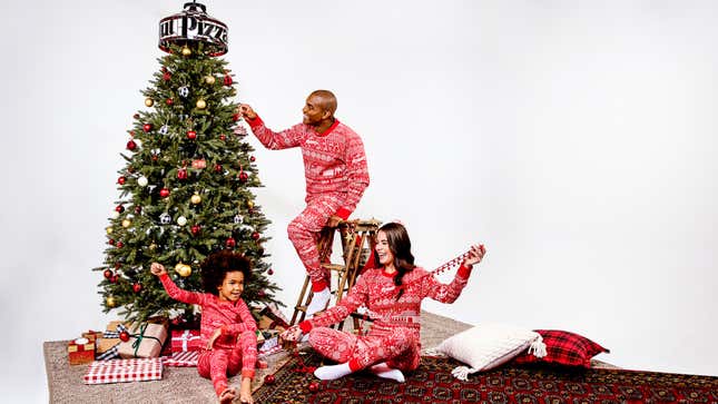 Pizza Hut Holiday Merch with tree topper, pajamas, wrapping paper, ornaments, and more