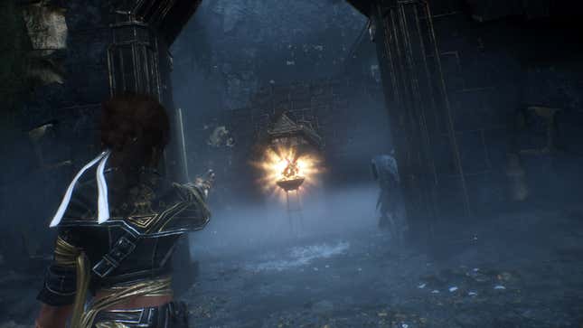Sciel looks at a glowing object in a maze.