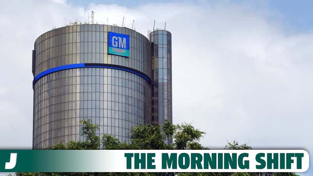 A photo of the GM logo on top of a building in Detroit. 