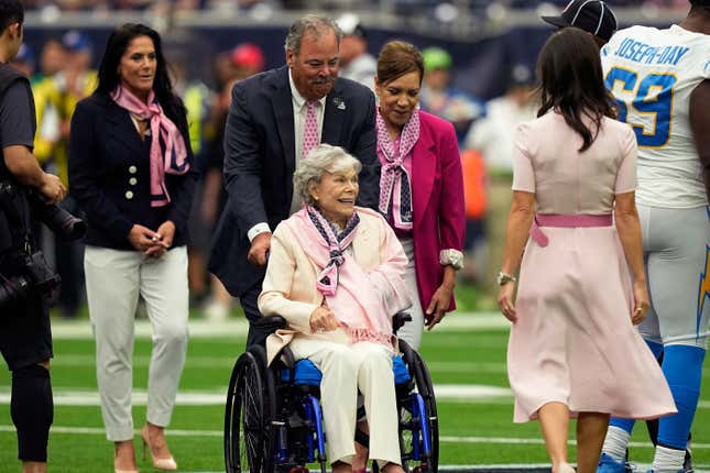 FILE - Houston Texans owner Janice McNair, enters with her son, Chairman and CEO Cal McNair before an NFL football game against the Los Angeles Chargers, Sunday, Oct. 2, 2022, in Houston. Court records show the owner of the Houston Texans is fighting efforts by one of her sons to have her declared incapacitated and have a guardian appointed for her. Janice McNair is fighting the guardianship proceeding initiated by one of her sons, Robert Cary McNair Jr. Attorneys for Janice McNair and her son Cal McNair, say the claims she&#39;s incapacitated are “drastic and unwarranted.” (AP Photo/David J. Phillip, File)