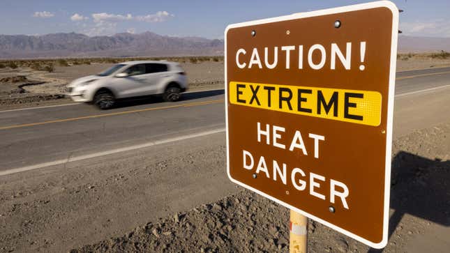 A photo of a sign warning of extreme heat. 