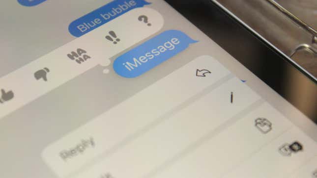 A phone screen showing iMessage, blue bubble messages and emoji reacts.
