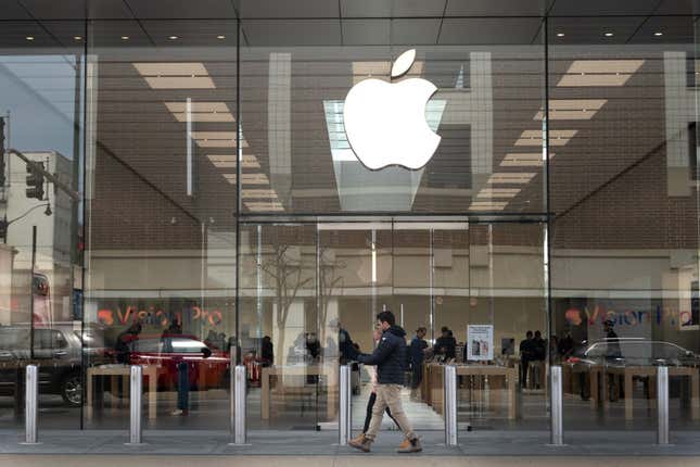 The Apple logo hangs outside an Apple store in Chicago, Illinois.