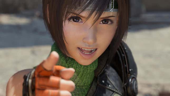 Yuffie looks and points at the camera.