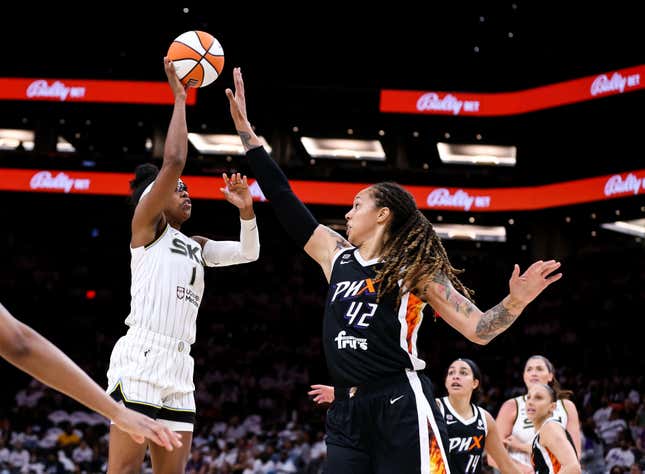 Brittney Griner #42 of the Phoenix Mercury contests a shot by Diamond DeShields #1 of the Chicago Sky in the second half at Footprint Center on October 10, 2021 in Phoenix, Arizona.