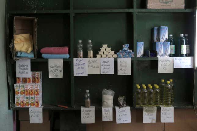 Products are displayed on a shelf in a government subsidized store where goods can only be purchased with a government ration book known as a “libreta,” in Havana, Cuba, Tuesday, March 12, 2024. The “libreta,” was launched in July 1963 and became one of the pillars of the island’s socialist system, helping people through crises including the cutbacks in Soviet aid that led to the 1990s deprivation known as the “Special Period.” (AP Photo/Ariel Ley)