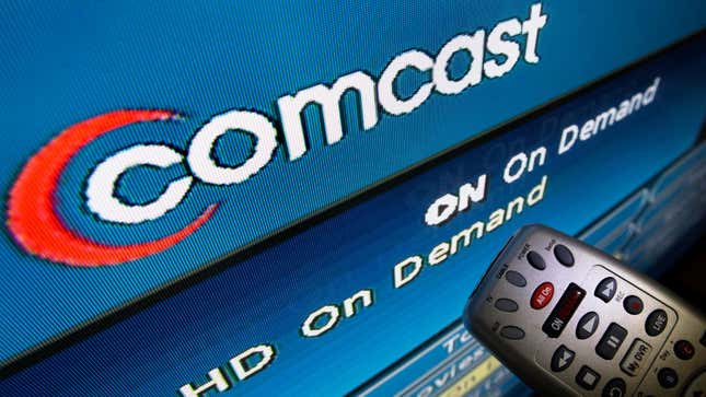 In this Aug. 6, 2009 file photo, the Comcast logo is displayed on a TV set in North Andover, Mass.