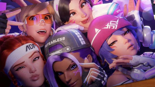 Tracer, D.Va, Brigitte, Sombra, and Kiriko pose for a selfie.