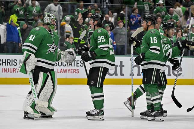 Nov 20, 2023; Dallas, Texas, USA; Dallas Stars goaltender Scott Wedgewood (41) and center Matt Duchene (95) and center Joe Pavelski (16) celebrate on the ice after the Stars victory over the New York Rangers at the American Airlines Center.