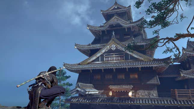 Naoe looks up at a fuedal Japanese structure.