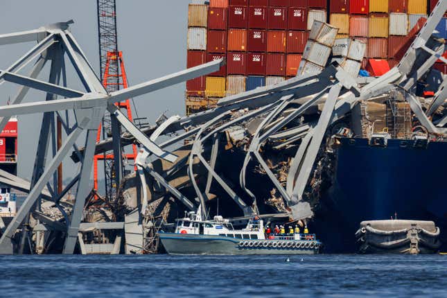 Salvage work continues on the collapsed Francis Scott Key Bridge, Monday, April 15, 2024, in Baltimore. The FBI confirmed that agents were aboard the Dali conducting court-authorized law enforcement activity. (AP Photo/Julia Nikhinson)