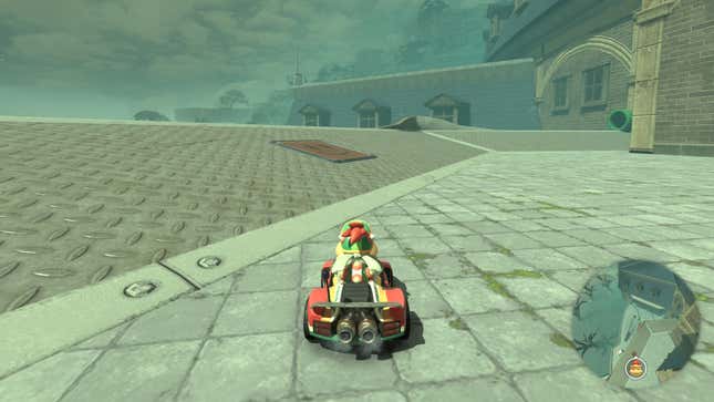 Bowser Jr. sits in a kart in front of a question mark panel.