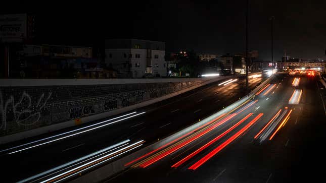 Car lights are blurred on a busy road