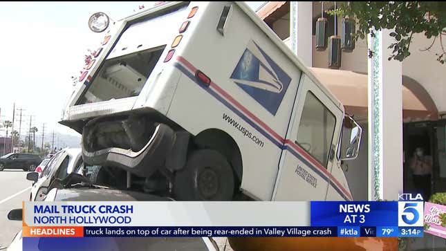 Image for article titled A Mail Truck Somehow Ended Up On Top Of The Car That Crashed Into It