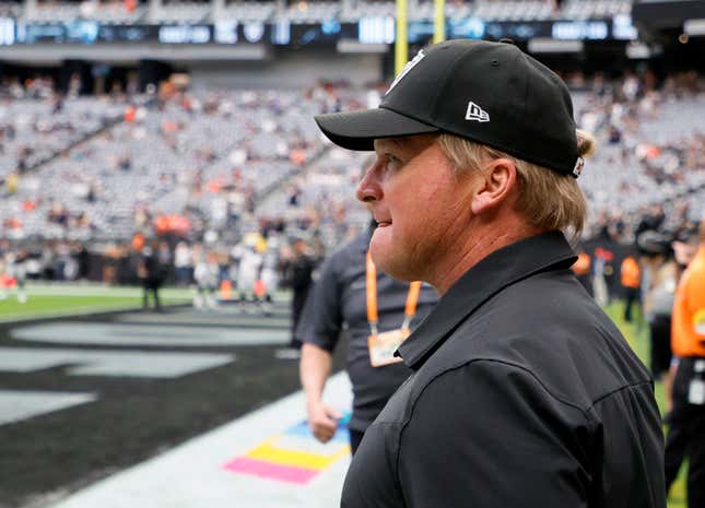 Jon Gruden of the Las Vegas Raiders walks on the field before a game against the Chicago Bears at Allegiant Stadium on October 10, 2021 in Las Vegas, Nevada.