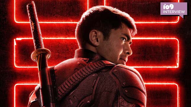 Henry Golding in a crop of the Snake Eyes poster with his back to camera and face turned, and wearing a sword.