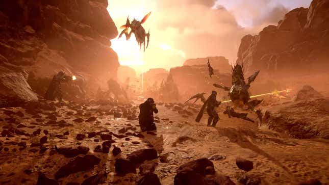 A screenshot of a Helldivers 2 squad fighting Terminids on a desert planet.
