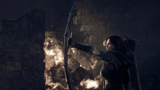 A woman fires a bow.