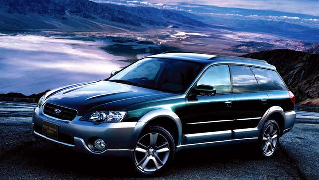 A photo of a Subaru Outback parked on a road. 