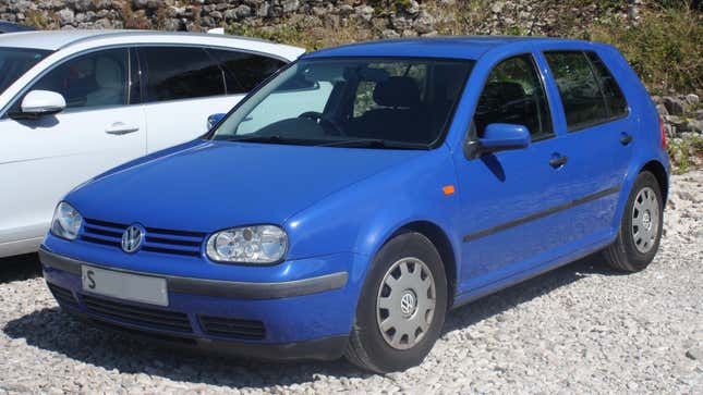 A blue 1998 Volkswagen Golf S 1.4