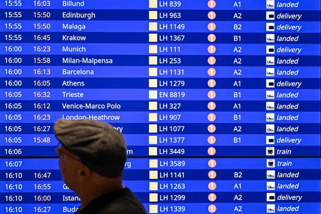 A board displays the status of arriving flights at the internatinal airport in Frankfurt am Main, western Germany, on October 12, 2023.