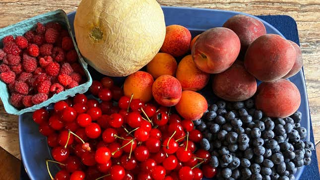 Raspberries, cantaloupe, peaches, currants, and blueberries