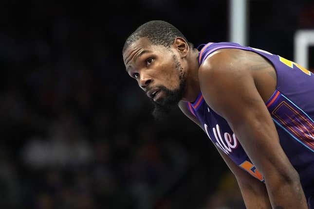 Nov 10, 2023; Phoenix, Arizona, USA; Phoenix Suns forward Kevin Durant (35) watches a replay against the Los Angeles Lakers in the first half at Footprint Center.