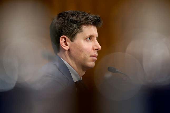 Man with a microphone in a congressional hearing