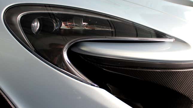 A close up photo of the McLaren P1's headlamp. 