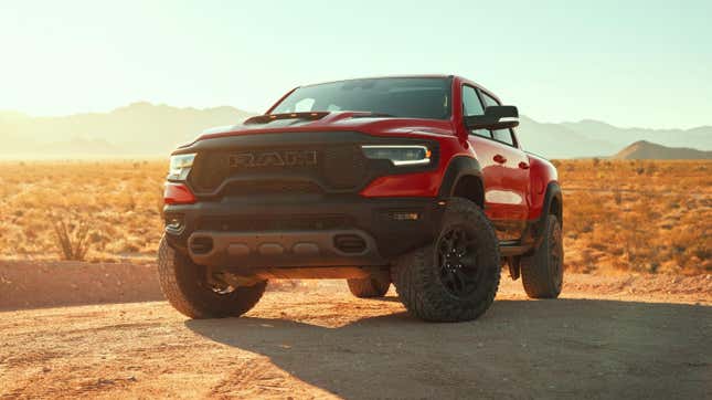 A red Ram 1500 TRX stopped in the middle of the desert