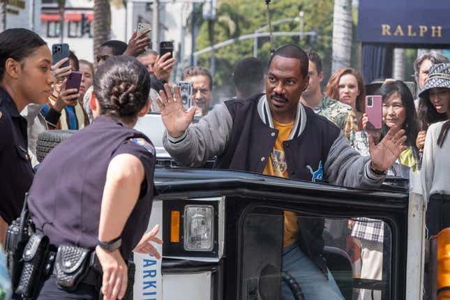 Bria Murphy as Officer Renee Minnick and Eddie Murphy as Axel Foley in Beverly Hills Cop: Axel F. 