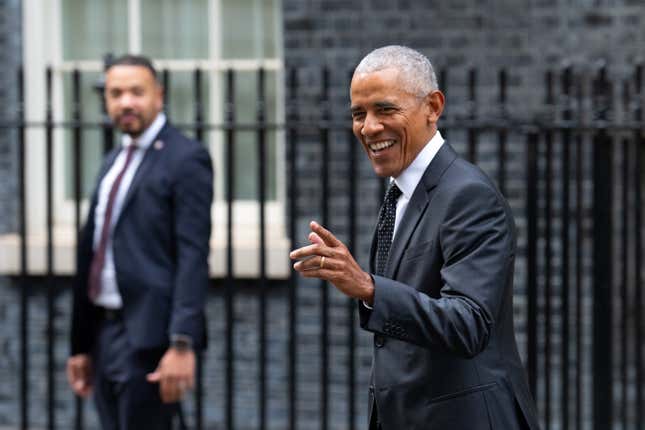 LONDON, ENGLAND - MARCH 18: Former United States President Barack Obama gestures to a journalist as he leaves 10 Downing Street after meeting UK Prime Minister, Rishi Sunak, on March 18, 2024 in London, England. President Obama has been in Europe this week and appeared at a moderated debate “An Evening with President Barack Obama” last night in Antwerp. The evening focussed on his vision of the future and the challenges the world is facing. 