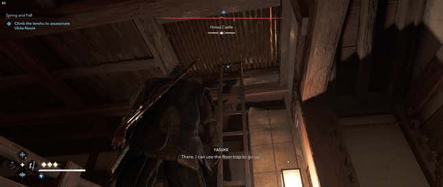 Yasuke looks up a ladder going through a trap door.