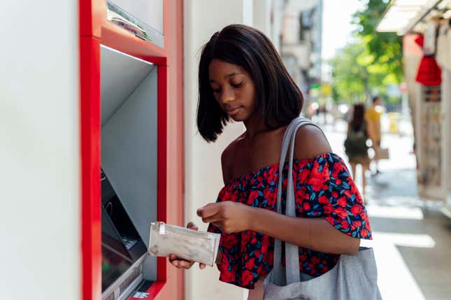 Black woman at ATM 