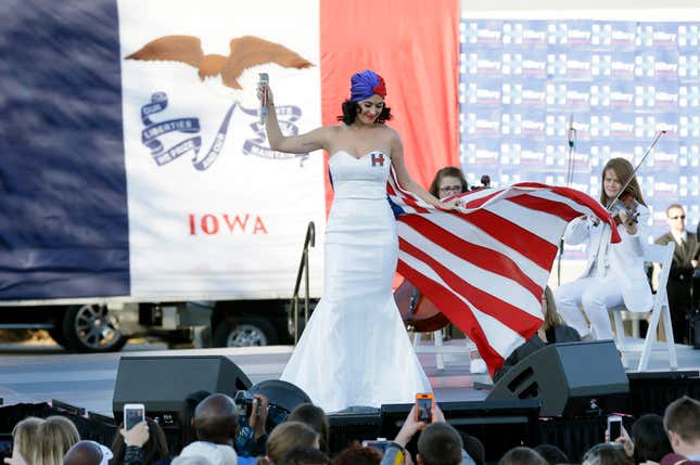 Singer Katy Perry performs during a rally for Democratic presidential candidate Hillary Rodham Clinton before the Iowa Democratic Party's Jefferson-Jackson Dinner, Saturday, Oct. 24, 2015, in Des Moines, Iowa. (AP Photo/Charlie Neibergall)