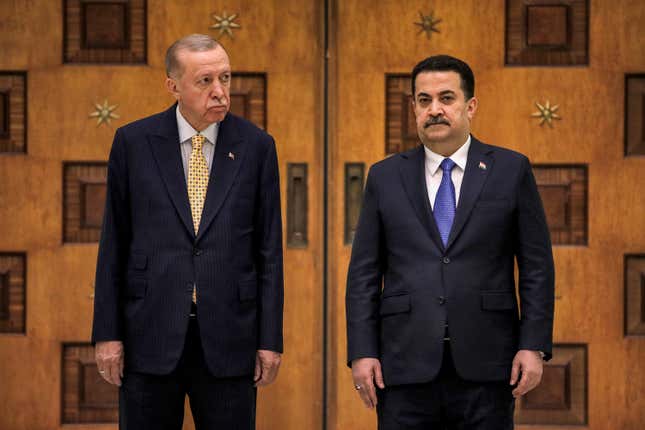 Iraq&#39;s Prime Minister Mohammed Shia al-Sudani, right, and Turkey&#39;s President Recep Tayyip Erdogan look on during their meeting in Baghdad, Iraq, Monday April 22, 2024. (Ahmad Al-Rubaye/Pool via AP)