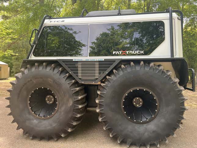 A side view of the Fat Truck showing its massive tires and unorthodox look
